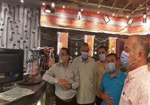 معاون محافظ بني سويف يتفقد تطبيق الإجراءات الاحترازية بالمحال التجارية والأسواق (صور)