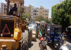 جهاز مدينة العبور ينفذ حملة جديدة لإزالة الإشغالات ويكثف أعمال تطوير الطرق والميادين