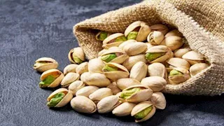 كيف يؤثر تناول الفستق على مستوى الكوليسترول في الدم؟