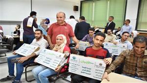 التحالف الوطنى للعمل الأهلى يقدم أجهزة لاب توب لذوى الهمم من طلاب جامعات أسيوط