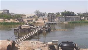 شاهد بالصور أعمال إنشاء كوبري المشاه بقرية وردان بالجيزة