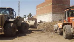 بالصور- إزالة 12 حالة تعدٍ على الأراضي الزراعية بالمنيا
