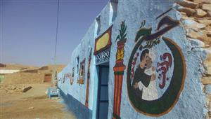   عادات الحجاج في الصعيد.. الجريد الأخضر والزعف والكتابة على مدخل البيت