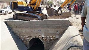 بالصور- إزالة 11 كوبري مخالف على ترعة النغاميش بسوهاج