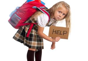 ماذا تفعل الحقيبة المدرسية بظهر طفلِك؟- طبيب يجيب