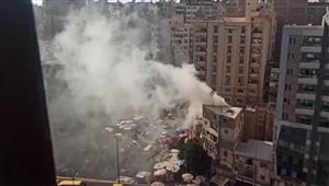صور- حريق عقار في ميدان الساعة بالإسكندرية 