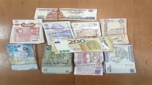 ضبط شخصين حاولا تهريب مبالغ مالية وأقراص للخارج بمطار القاهرة