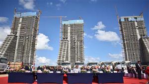 الإسكان تنظم احتفالية  للانتهاء من الهيكل الخرساني لأول برج  بمجمع أبراج "داون تاون"  بالعلمين الجديدة