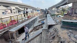 بعد سقوطه.. أعمال ترميم وإصلاح كوبري الثلاجة على الطريق الزراعي بالقليوبية - صور