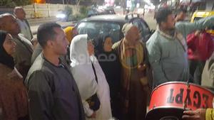 بالطبل والمزمار.. الأهالي يودعون المعتمرين في كفر الشيخ - صور