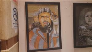  لوحة "الشيخ مهساس والقطة" تجذب رواد معرض فني بكفر الشيخ - صور