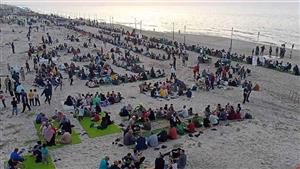 6 كيلومترات و21 ألف شخص.. تفاصيل أطول مائدة إفطار على شاطئ العريش