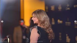 خيري بشارة وليلى علوي على السجادة الحمراء لمهرجان هوليوود للفيلم العربي