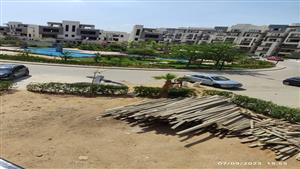 جهاز حدائق أكتوبر: إزالة أدوار مخالفة في كمبوند والتحفظ على الأخشاب وأدوات البناء