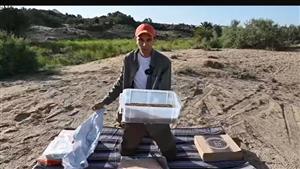 "حواوشي دود معمول بدهن الثعبان".. تجربة "مجنونة" من شاب مصري وهذا رد فعله