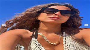 إيمان العاصي أنيقة في أحدث ظهور على شاطئ البحر