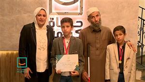 "حياة كريمة" تُكرم الطفل حمزة بطل من ذوي الهمم بالمنيا 