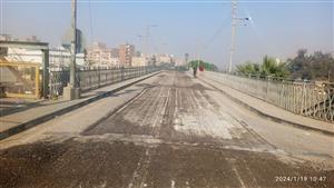 بالصور- بعد إغلاقه 3 أسابيع.. بدء صيانة وتطوير الكوبري العالي بالمنيا