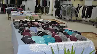 ألف قطعة ملابس مجانية لطلاب جامعة حلوان.. صور