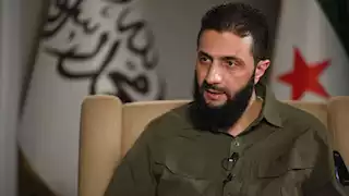 من القاعدة والسجن لقائد هيئة "تحرير الشام".. من هو محمد الجولاني؟