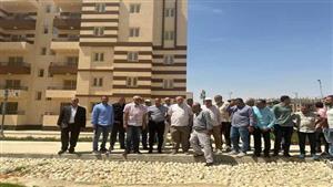 نائب رئيس هيئة المجتمعات العمرانية يتفقد شقق سكن لكل المصريين بحدائق العاصمة