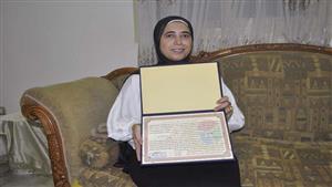 "هيام" سيدة أتمت حفظ وتجويد القرآن بالقراءات العشر في كفر الشيخ: "كتاب الله مصدر سعادتي" - صور