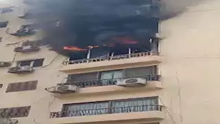 "النار طلعت من الشبابيك".. المعاينة تكشف ملابسات حريق شركة بالدقي