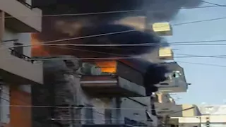 بالصور- حريق هائل أعلى محل شهير بشارع الحسيني التجاري في المنيا 