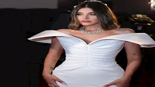 ظهرت بـ"الكوفية الفلسطينية" في أسبوع الموضة.. معلومات عن نور عريضة