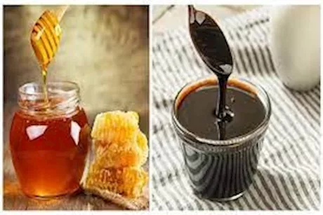 عسل النحل والعسل الأسود لعلاج الكحة- أيهما أفضل للأطفال؟