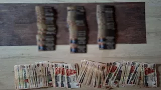 أموال وكروت دعائية.. ضبط متورطين في شراء أصوات الناخبين ببدر