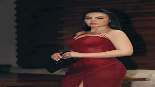 دينا فؤاد تتألق بفستان "أحمر ناري" وتعلق: "القوة ليست في العضلات"