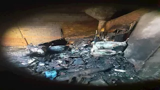 بالصور- حريق هائل يلتهم محلين في سوق عرفان بالإسكندرية