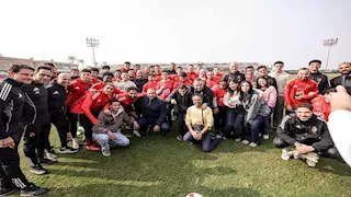 10 صور لزيارة مجموعة من ذوي الهمم لمران النادي الأهلي