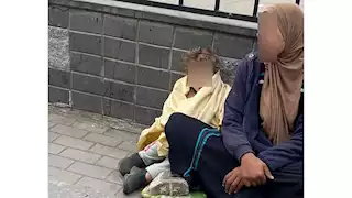  الداخلية تكشف تفاصيل تسول سيدة بطفل في ميدان الألف مسكن