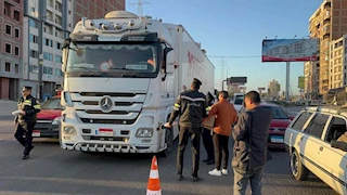 مرور الدقهلية يوزع 1500 وجبة إفطار صائم على الطرق السريعة -صور