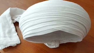 من كبرت عمامته الناس كلها في لمته”.. لماذا يرتدي الصعايدة “العِمّة البيضاء”؟