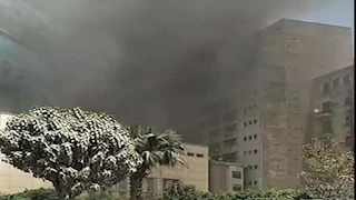 صور| السيطرة على حريق بمحيط مبنى البريد في رمسيس