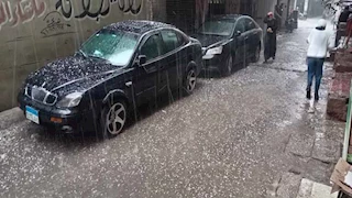 أمطار رعدية وتساقط كرات ثلجية في الوراق.. 6 صور