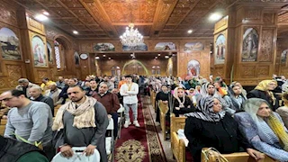 أجراس وترانيم.. قداس أحد السعف بكنيسة الأنبا بيشوي في بورسعيد - فيديو وصور 