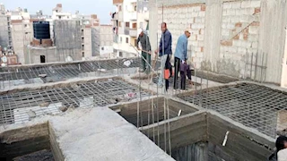 بالصور- إزالة 7 طوابق بـ "عقار الملك" في الإسكندرية