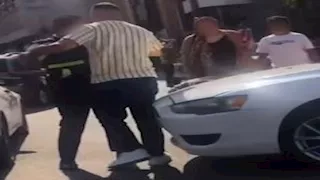 فيديو يوثق اعتداء سائق على رجل مرور بالجيزة والشرطة تتحرك