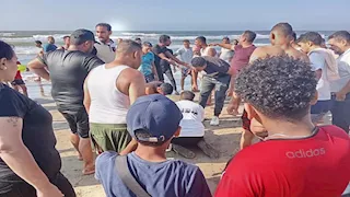 غرق شاب على شاطئ بورسعيد ونقل الجثمان لمشرحة مستشفى السلام (صور)