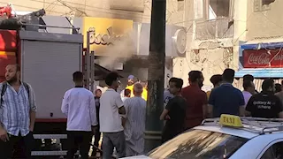 حريق يلتهم محل ملابس بمدينة المنيا (صور)