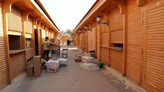 بدء تسكين أصحاب السوق القديم لسور الأزبكية بعد نقلهم.. 11 صورة للمكان البديل