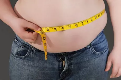 لماذا يزداد وزنك في منطقة البطن والظهر فقط؟