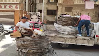 بالصور- بورفؤاد تُغلق محال فرز القمامة بمساكن الحزب الوطني في بورسعيد