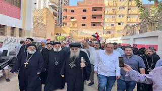 أسقف وقساوسة مغاغة يقودون مسيرة لدعم المشاركة في انتخابات الشيوخ بالمنيا- صور