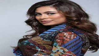 هاجر أحمد تتألق بفستان الورود الحمراء وإطلالة أنثوية ساحرة.. سر اللوك