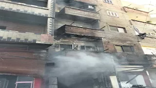 السيطرة على حريق بمحل في سوهاج (صور)